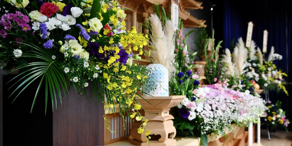 Elegant floral arrangements displayed during a memorial ceremony at Funeral Home and Cremations in New Berlin, WI.