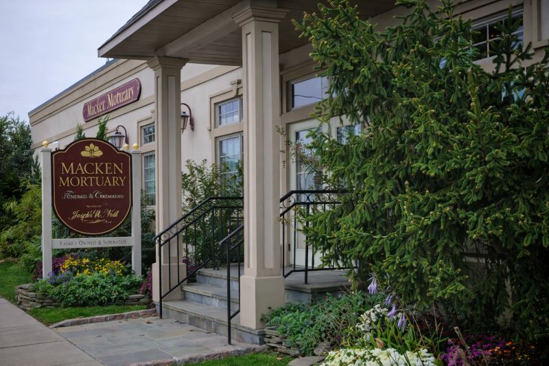 Macken Mortuary entrance and sign representing Long Beach, NY funeral home and cremations services